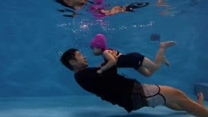 infant swimming lessons Singapore in indoor heated pool – parent and baby